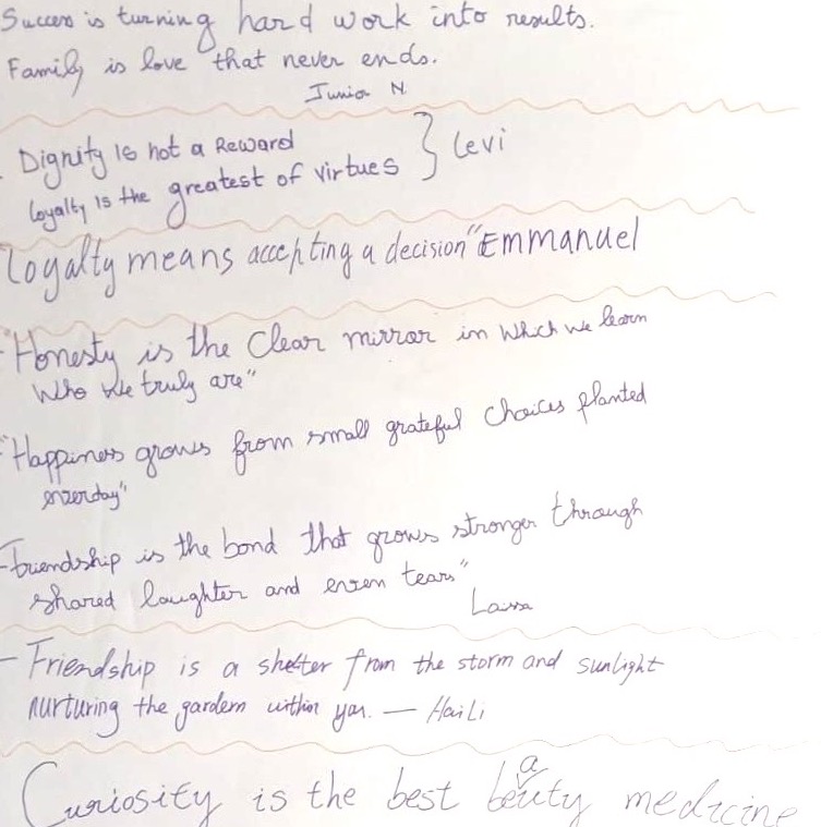 Sentences of encouragement for fellow students written on a whiteboard by English Langauge Students